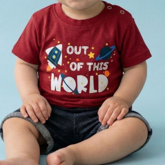 Child wearing a red shirt with a space-themed design on a blue background